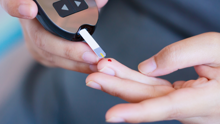 Pricking finger for blood test